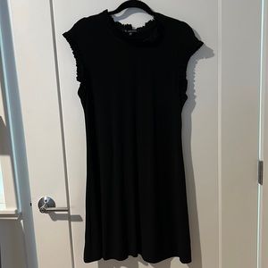 Ruffle top and arm holes. Above the knee office dress. Sleeve less. Size L